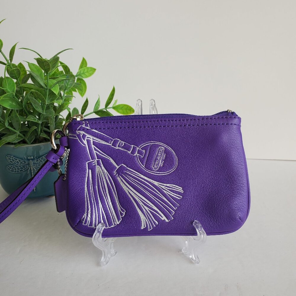 EUC Coach Wristlet in Purple with Trompe L’Oeil Tassel Design